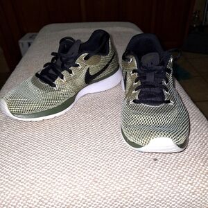 A pair of Nike tanjun racers. They are womens size 6.5. EUC